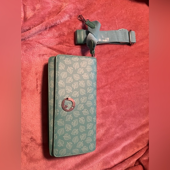 Animal Crossing Nintendo Switch Lite case. Never used, with strap. - Picture 8 of 10